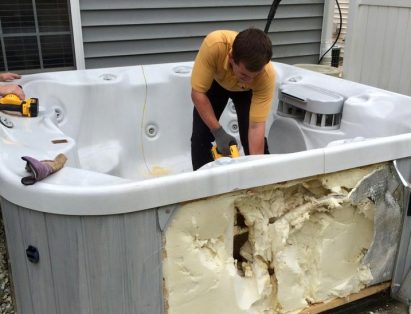 Old Hot Tub Being Cut By Saw